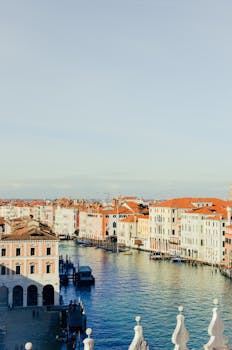 Explore the vibrant architecture along Venice's famous Grand Canal in this beautiful cityscape.