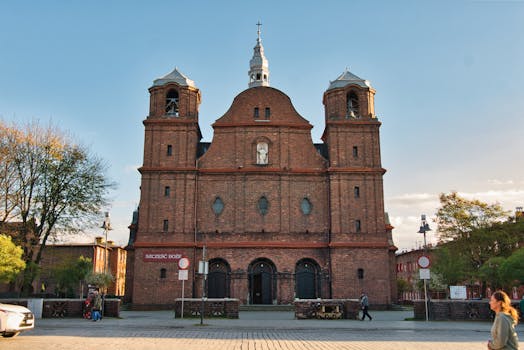 Explore the architectural beauty of a historic brick church in Katowice, Poland.