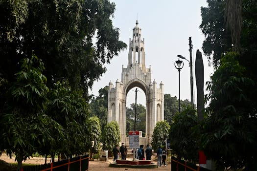 Photograph of the iconic entrance archway at Allahabad University in Prayagraj, India.