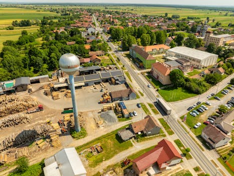 Aerial image showcasing an industrial area with surrounding buildings in Hercegovac, Croatia.