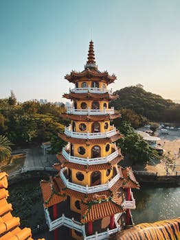 Stunning view of the Lotus Pond Pagoda in Kaohsiung, Taiwan, captured at sunset.